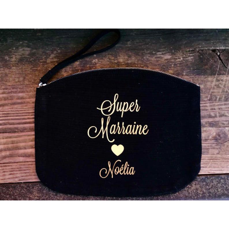 Pochette avec sangle poignet "Super Marraine"