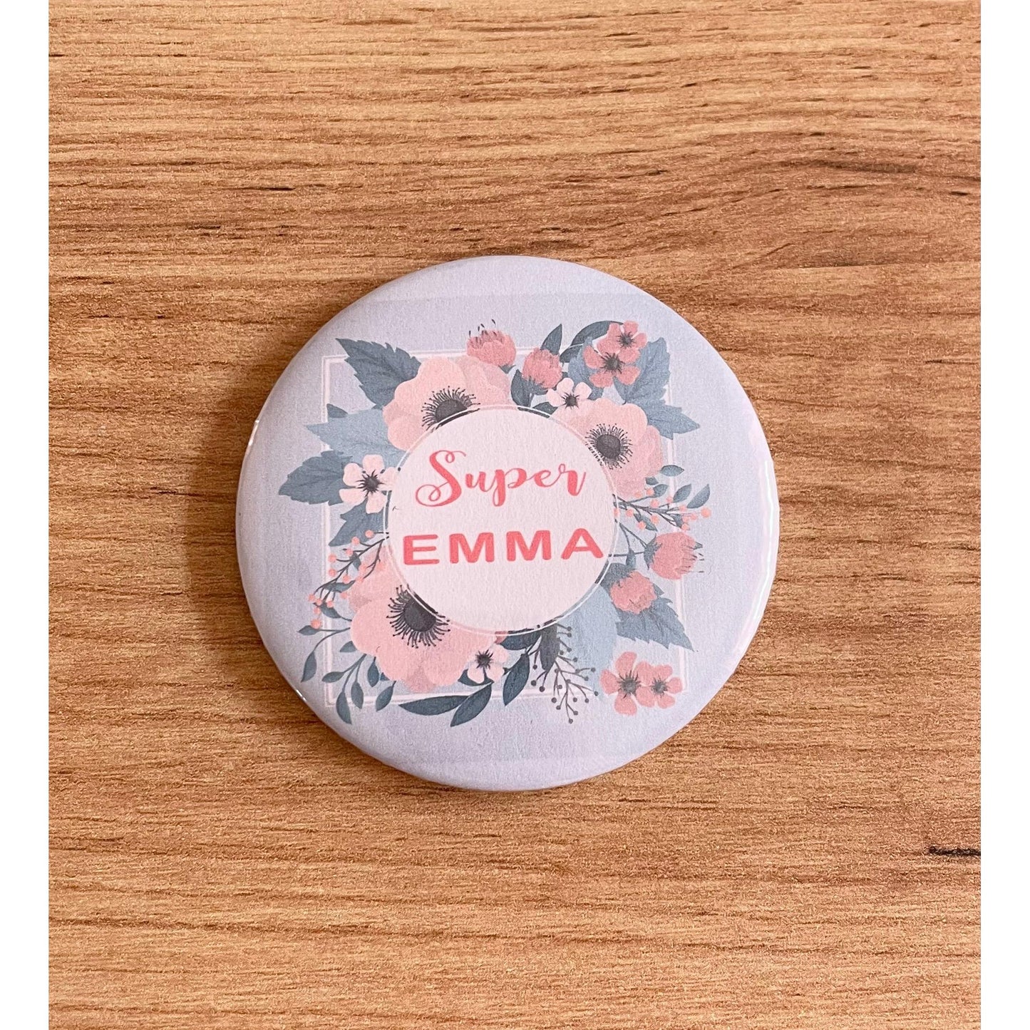 Badge "texte et couronne de fleurs"