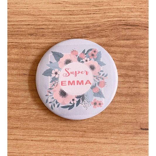 Badge "texte et couronne de fleurs"